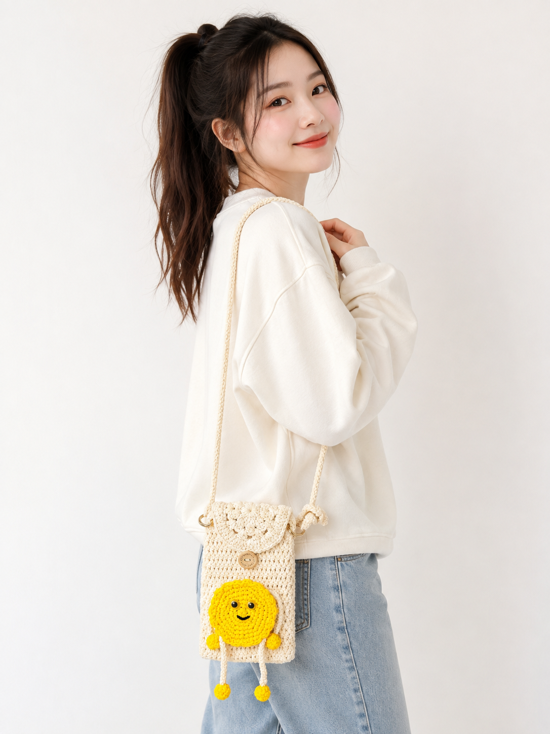 Crochet Smiley Crossbody Bag – Handmade Mini Phone Bag with Yellow Sun Charm